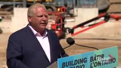 Ontario Premier Doug Ford swallows a bee during a live press conference