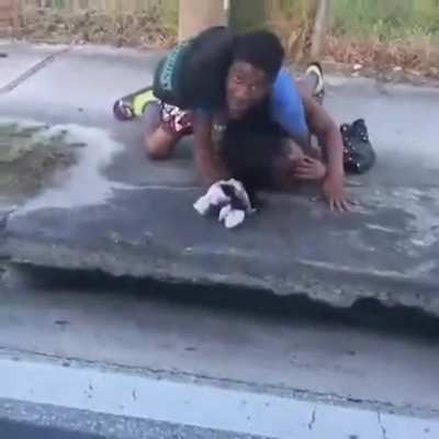 Transphobic driver passes by couple wrestling in public