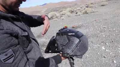 Guy tests the Japanese full-face ballistic helmet Devtac Ronin with a grenade, putting cantaloupe inside the helmet to see the effects of the shockwave.