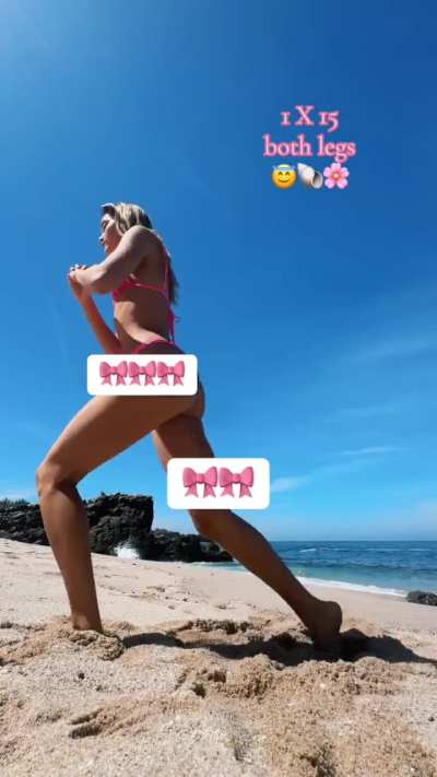 Olivia Ponton working out on the beach