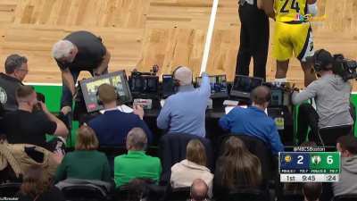 [Highlight] Jaylen Brown comes crashing into the sideline and commentators table as a fan saves his drink