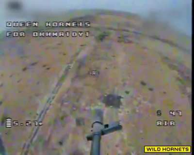 A wild Hornet Queen drone equipped with an automatic rifle on its first combat deployment&mdash;targeting a position with russian forces.