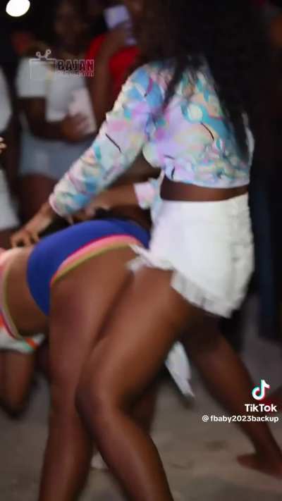 Humping her friend hard on the dance floor