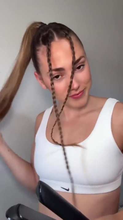 Doing her hair