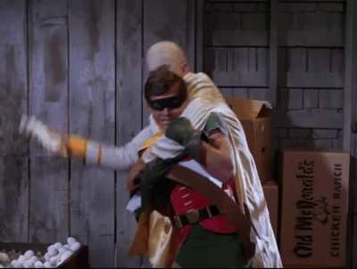 Batman and Robin in an egg fight with Egghead and his goons (x-post /r/batmangifs)