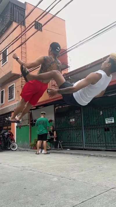 I wonder how long does a person have to practice in order to back flip over another person with out falling on them.🤯