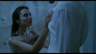 Adrienne Sachs naked in the shower, showing boobs, butt, and a hint of bush.
