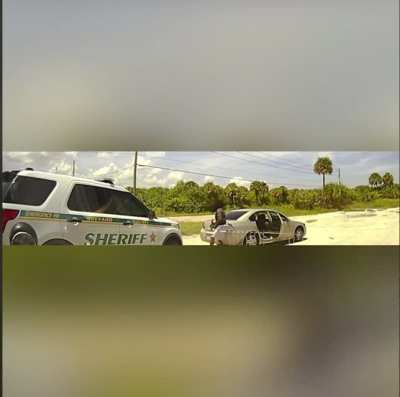 Police ambushed by a scum bag in Florida. Officer can be heard at the start saying &ldquo;I got babies at home too, man&rdquo;