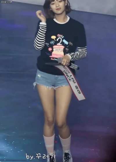 Jeongyeon - cat ears, jean shorts, black t-shirt, pink socks