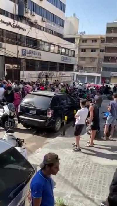 Footage of what preserving our honor looks like; chaos in front of exchangers to buy the American currency