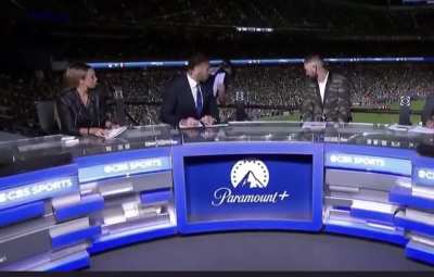Guy falls off ledge during CBS coverage