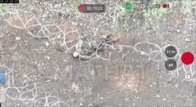 Russian soldier tries to commit suicide by cutting his throat with barbed wire.