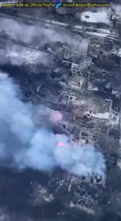 Madyar - UA drone recon. Outskirts of Bahmut. Looking over ru trenches, a few artillery hits, a few charges dropped from drones. Morning of 9th Feb. Subtitled