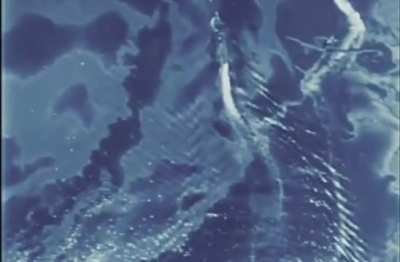 Japanese cruisers and destroyers under attack by US Navy dive bombers off Rabaul in November 1943