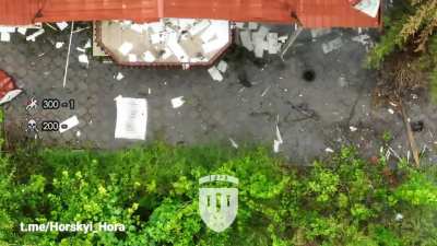 Russian assault group was spotted by an Ukrainian surveillance drone and attacked by munition-drop drone while taking cover in a house, resulting in one wounded (pay attention to his silencer-equipped AK model).