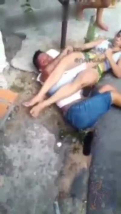 Girl grabs a man in a arm-lock, and threatens to break his arm and fingers