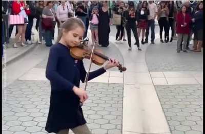 This little Lady Confident playing "Sunflower"