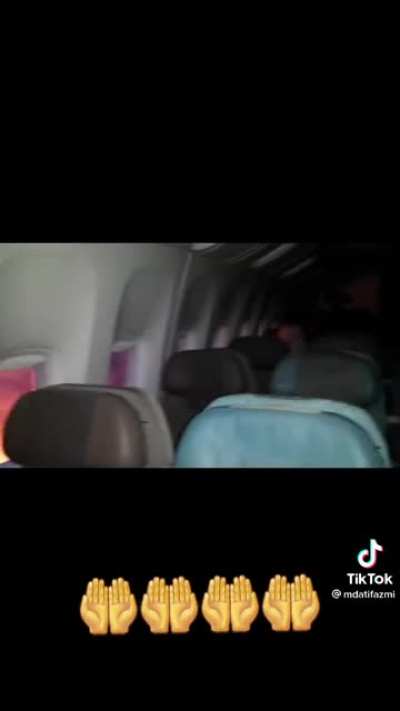 Wing of airplane is on fire