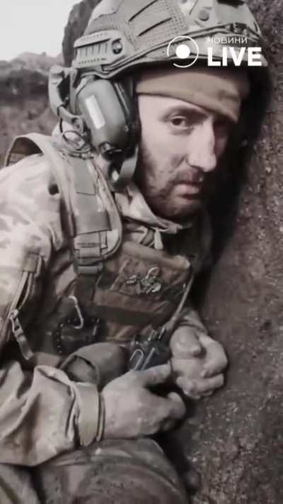 Ukrainian soldier wakes up comrade who slept in the trench. His face says everything. 