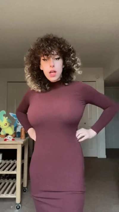 Filling out that dress nicely.