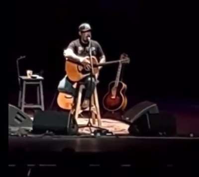 Staind's Aaron Lewis saying "Maybe we should listen to what Vladimir Putin has to say" and "Why are we trying to protect Ukraine so much?" Continues on to explain how dead Ukrainians are a hoax, Putin is fighting the 'Deep State' etc.