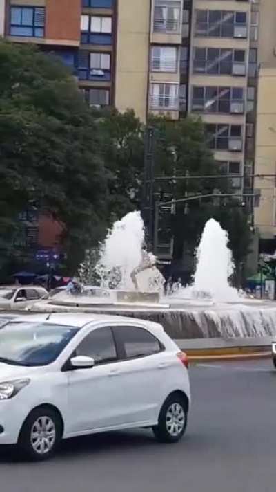 Man humping water fountain