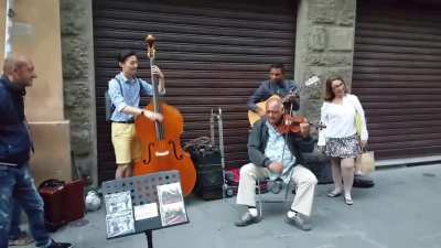 Street Performers Vibing with a Tourist Contrabass Player
