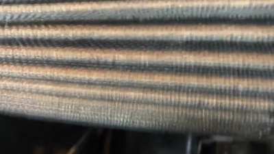High-pitched metallic rattle from engine on cold start