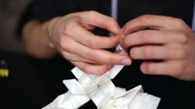 Folding process of an origami samurai from a single sheet of paper