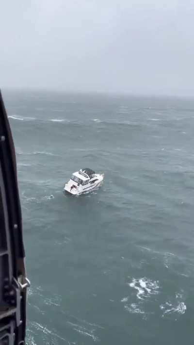 Coast Guard video of Boat about to be capsized by wave