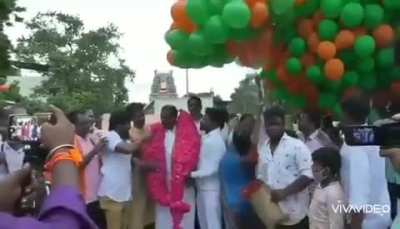 People Light Firecrackers Near Helium Balloons