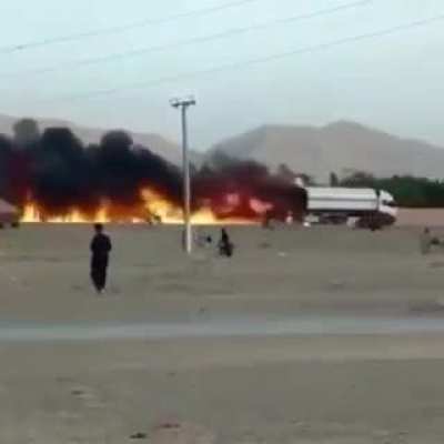 driving burning truck away from city