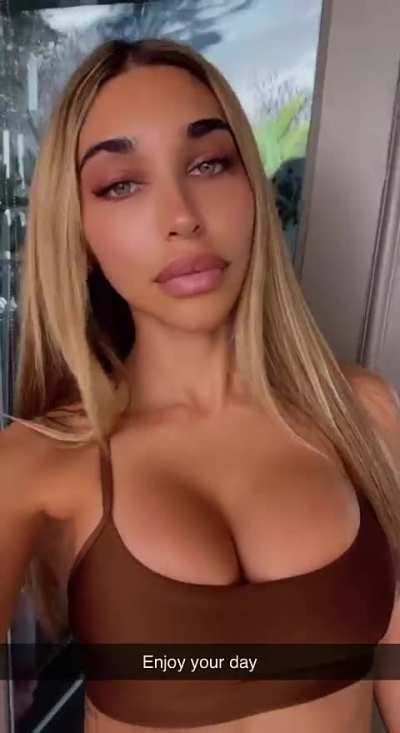 cleavage in brown sports bra