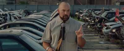 Car auction scene from Widows (2018)