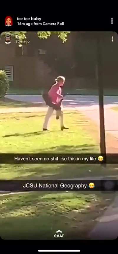 teacher picks up goose with bear hands