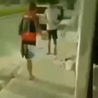 Kicking the hell out of him.