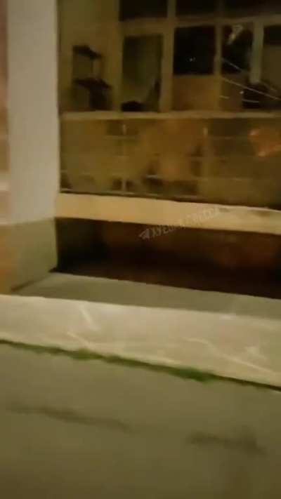 Odessa city. Swastika banner on the wall in residential building.