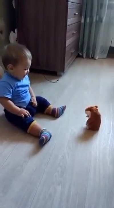 Kid being threatened by deadly toy