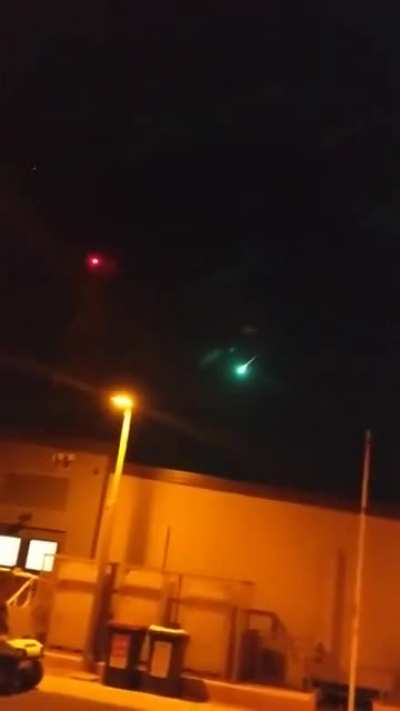 A meteor streaks through the night-sky, over Australia.