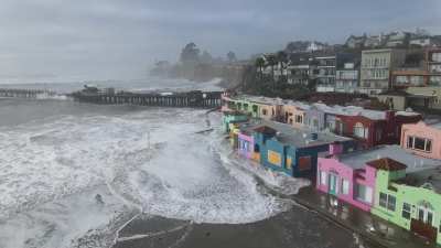 Capitola this morning, wave in the background makes it all the way up the cliff