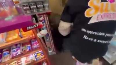 The shopkeeper wasn't having it. He knocked him out and dragged him out of the shop!