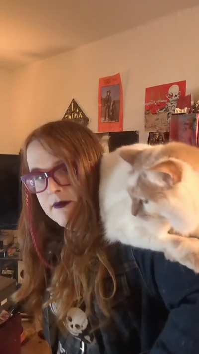 She sees me standing and automatically decides that she needs to be held