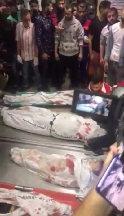 Israeli warplanes murdered the entire family of Abu Hatab in Gaza city, 5 kids died along with their mom - only an infant survived (pictured at the end of the video )