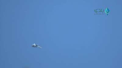 Camera tracks a Russian jet making rocket runs against Syrian Opposition controlled positions in N. Hama - 3/24/2017