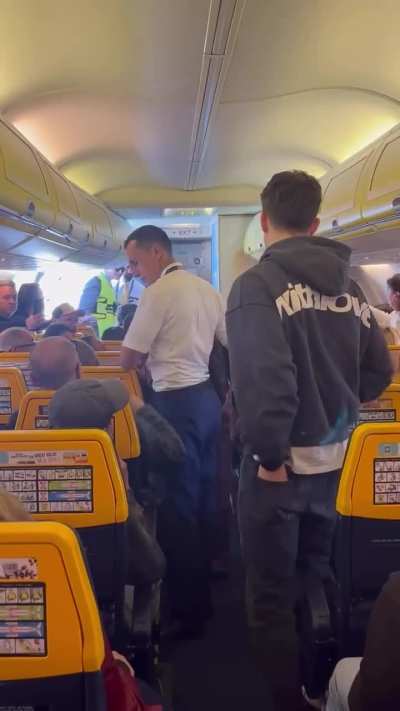 Polyglot Greek Goddess Stavroula flexing her Duolingo Malaka skills on Marrakech - Barcelona Flight.