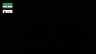 Syrian rebel technical at night.