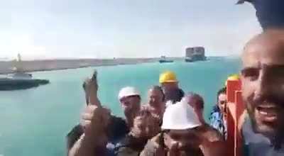 Egyptian crew of tug boat named Mashour celebrate after freeing of Ever Given by chanting 