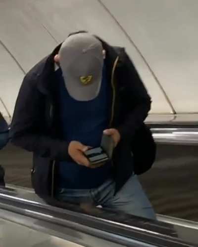 Friendly group of escalator riders