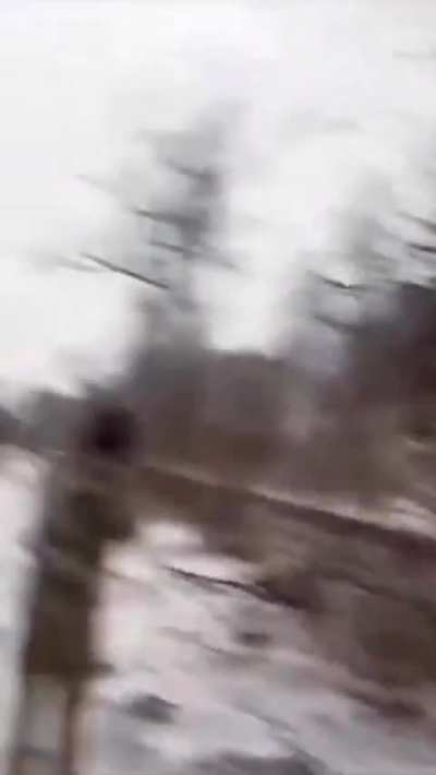 Russian soldier shooting at Ukrainian drone, but falls into an open hatch 2025