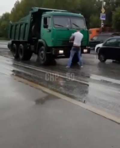 Man vs dump truck